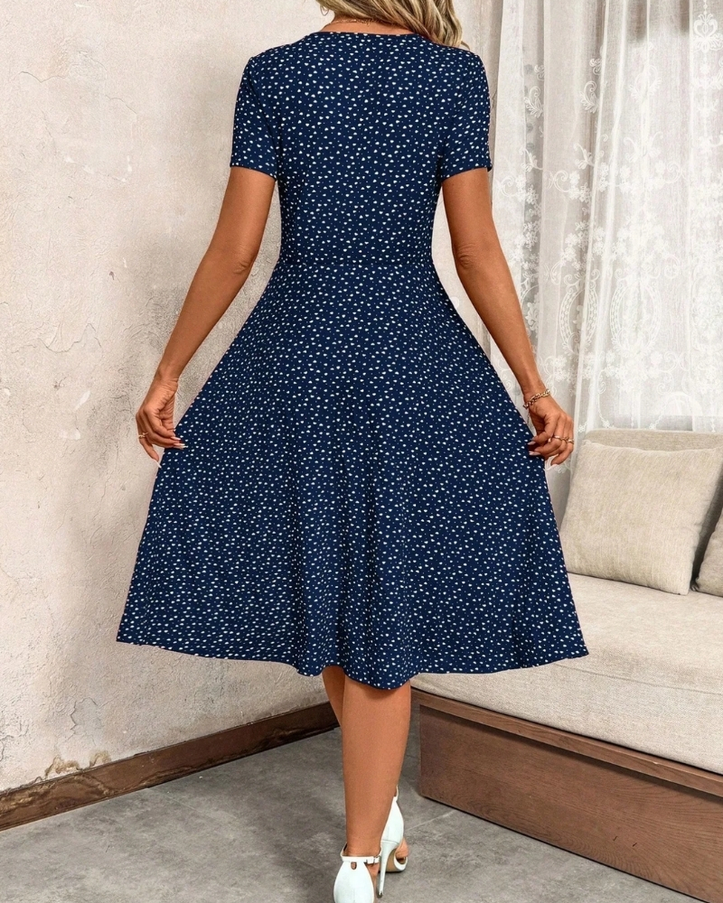 Robe midi à pois à manches courtes