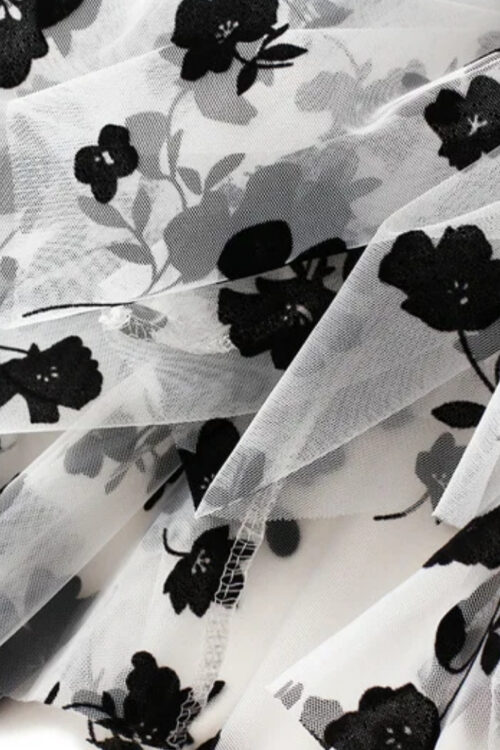 Jupe longue en dentelle fleurie à appliqués