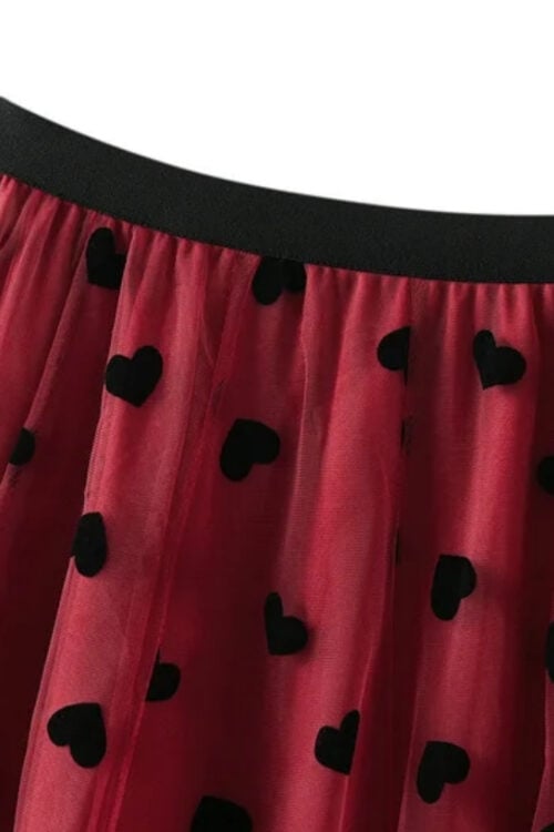 Jupe longue en dentelle fleurie à appliqués